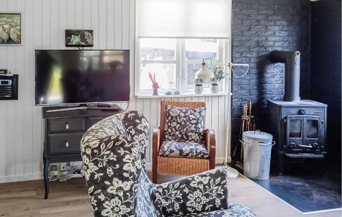 TV a/nebo společenská místnost v ubytování Holiday Home Hals Xviii