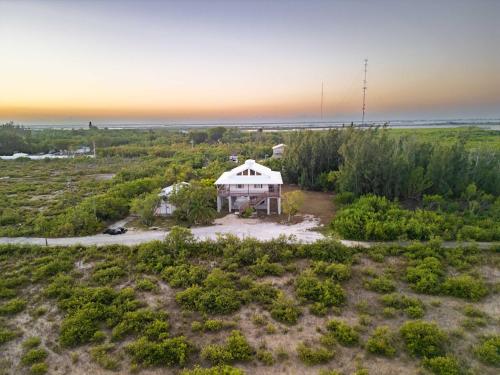 an aerial view of a house in a field at Starlight Serenity - Hideaway with Stunning Views in Pirates Cove