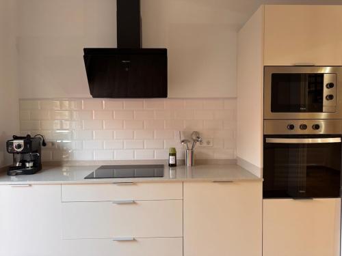 Kuchyň nebo kuchyňský kout v ubytování Casa Arcoíris