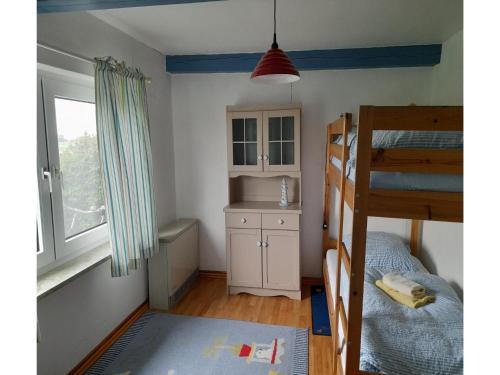 Opas Hus auf Pellwormにあるベッド