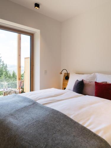 Postel nebo postele na pokoji v ubytování Die neue Weizerhütte