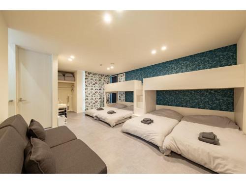 Voodi või voodid majutusasutuse Condo Stay Kamakura Sakanoshita Nozomi - Vacation STAY 18875 toas