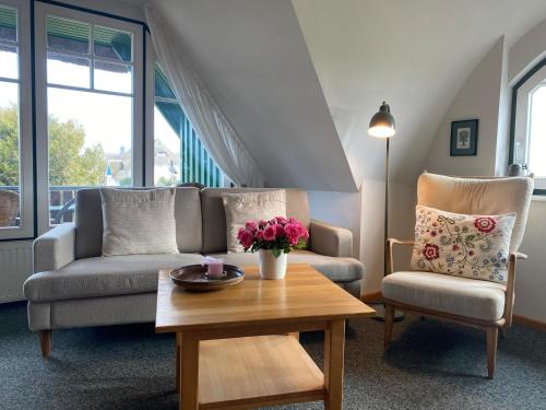 Posezení v ubytování Ferienwohnung Nr 07 OG Spitzboden