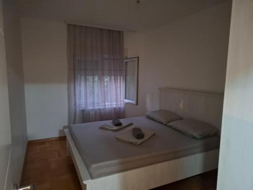 Postel nebo postele na pokoji v ubytování Apartman Telep