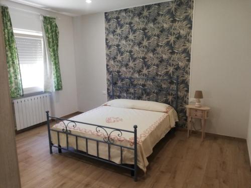 Postel nebo postele na pokoji v ubytování Casa vacanze Tenuta Camilli