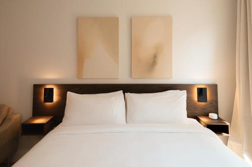 Katil atau katil-katil dalam bilik di Boardwalk Suites & Residences by Kasa