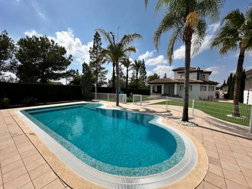 Swimmingpoolen hos eller tæt på Casa de las Palmeras Golf