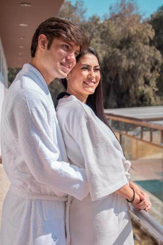 a man and a woman standing next to each other at Hotel La Mansion in Tacna