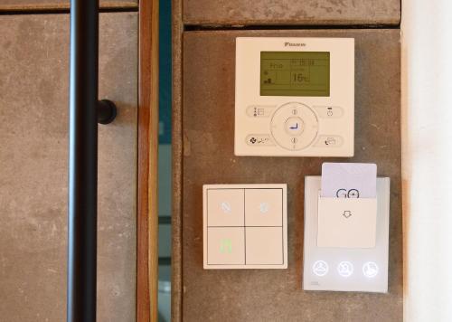 a door with an electronic device on it at GO Quito Hotel in Quito