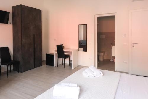 Postel nebo postele na pokoji v ubytování S'Olivare Posada - Rooms