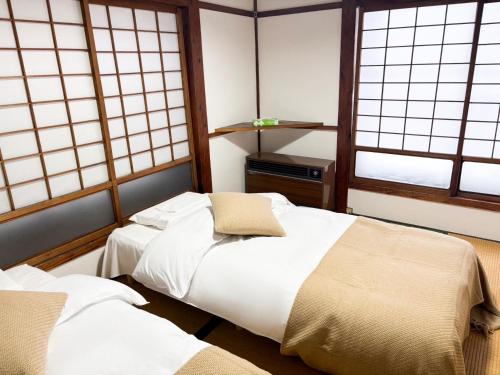 Postel nebo postele na pokoji v ubytování nozomi - Vacation STAY 36933v