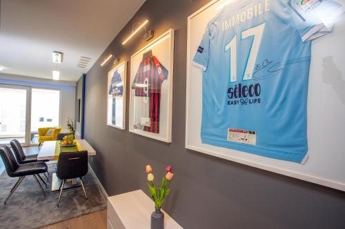 a room with attenham jersey hanging on a wall at SeaSide Haven in Split