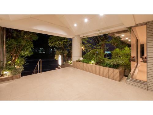 a view of a patio with plants and lights at Sun Hotel Fukuyama - Vacation STAY 53433v in Fukuyama