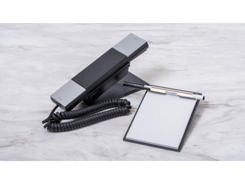 a black phone with a cord and a clipboard at Sun Hotel Fukuyama - Vacation STAY 53496v in Fukuyama