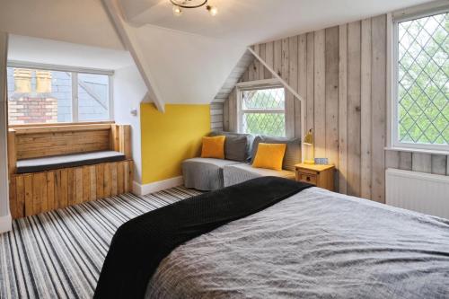 Ένα ή περισσότερα κρεβάτια σε δωμάτιο στο Rowcroft Lodge Guest House B&B