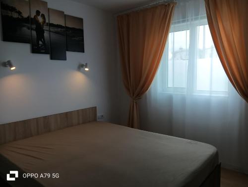 Katil atau katil-katil dalam bilik di Apartament Briza