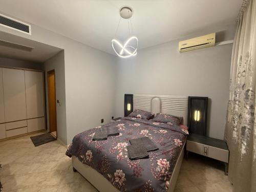 Ένα ή περισσότερα κρεβάτια σε δωμάτιο στο YS Platinum Residence