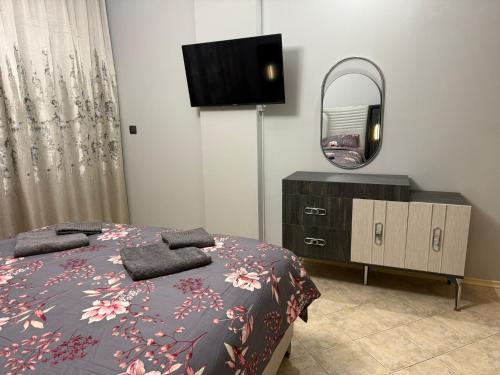 Μια τηλεόραση ή/και κέντρο ψυχαγωγίας στο YS Platinum Residence