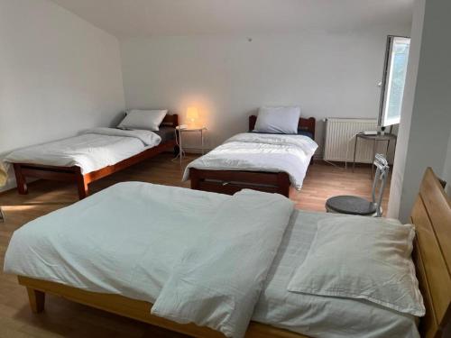 Aliyah Hostelにあるベッド