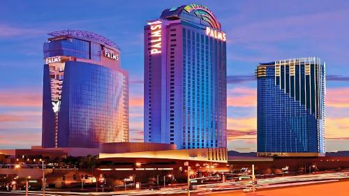 a group of three tall buildings in a city at Vista Balcony Collection - StripSuite Palms Place Hotel, Resort & Casino in Las Vegas
