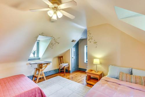 a bedroom with a bed and a ceiling fan at 8 Mi to Reading Spacious Farmhouse Retreat! in Birdsboro