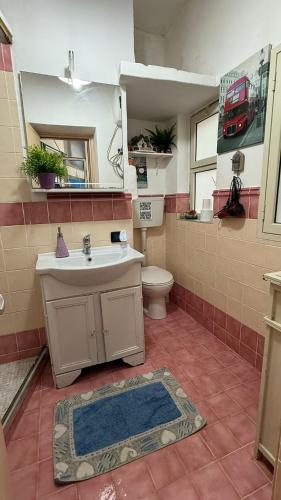 a bathroom with a sink and a toilet at OPEN SPACE in Augusta