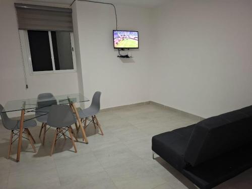 TV a/nebo společenská místnost v ubytování BUSINESS CLASS Departamentos