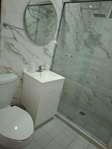 Koupelna v ubytování BUSINESS CLASS Departamentos