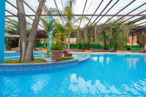 Πισίνα στο ή κοντά στο Un oasis campestre con alma mexicana