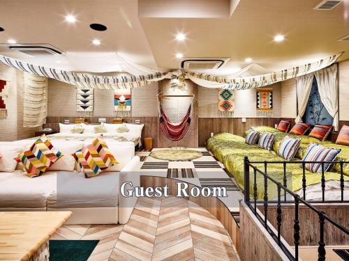 a room with two beds on a yacht at Hotel Balian Resort Shinjuku Honten in Tokyo