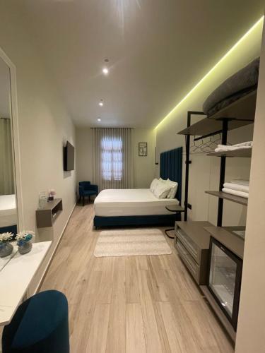 A bed or beds in a room at The cosy inn vlora
