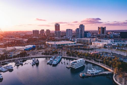 a view of a city with boats docked in a harbor at Lumea by the Sea in Long Beach