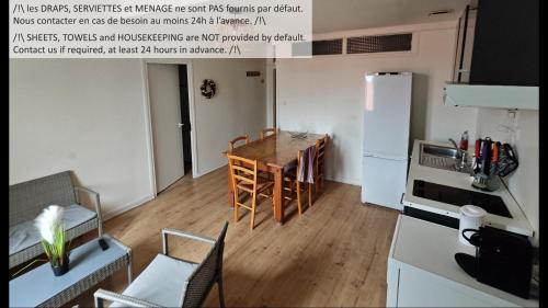 Η κουζίνα ή μικρή κουζίνα στο Appartements simples et fonctionnels