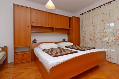 Apartments by the sea Rab - 20222