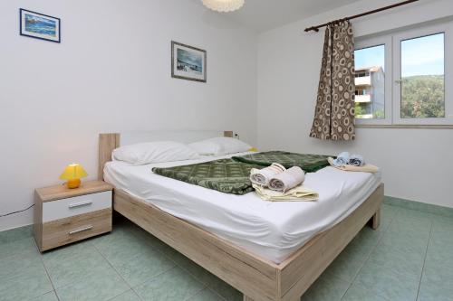 Apartments by the sea Rab - 20222