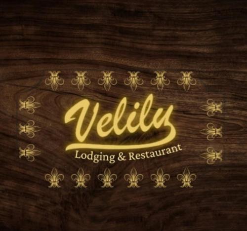 a sign with the name ofvalley on a wooden wall at Hospedaje velilu in Ica