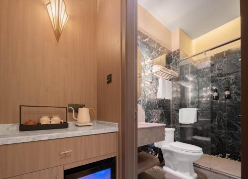 Koupelna v ubytování Mudita Hotel
