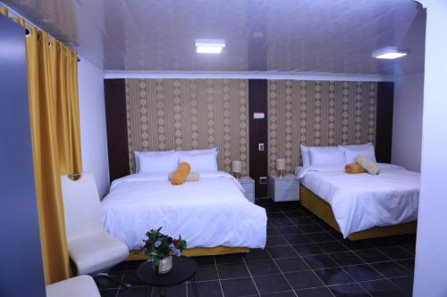 Postel nebo postele na pokoji v ubytování Kairos Guest Lodge Bedfordview