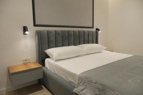 Postel nebo postele na pokoji v ubytování HORIZONT Premium Apart-Hotel