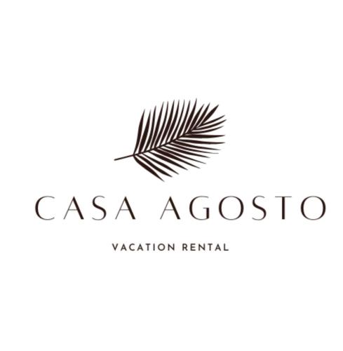 a palm leaf logo on a white background at Surfers bungalow 5 min walk to the beach in Tamarindo