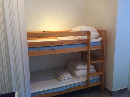 a bunk bed room with two bunk beds at Aurora Bed & Breakfast in Simrishamn