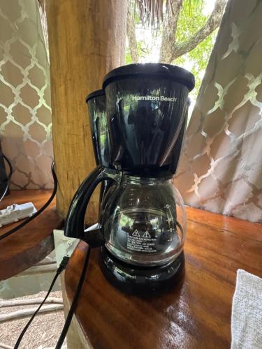 a black blender sitting on top of a table at Casa Nova at La Escapadita in Esterillos