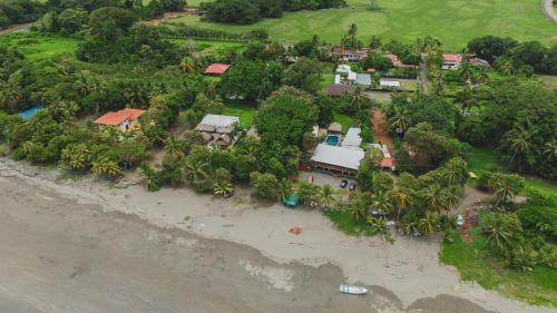 an aerial view of a house on the beach at Casa Nova at La Escapadita in Esterillos
