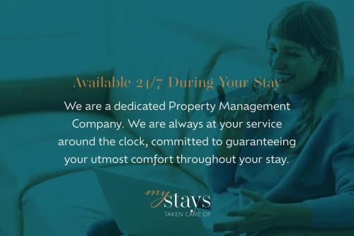 a woman sitting on a couch with the words winksify driving your at Soak & Stay Acacia Bay - spa, pet, family friendly in Taupo
