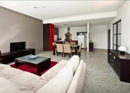 Μια τηλεόραση ή/και κέντρο ψυχαγωγίας στο Luxury Apartment in the heart of Perth CBD