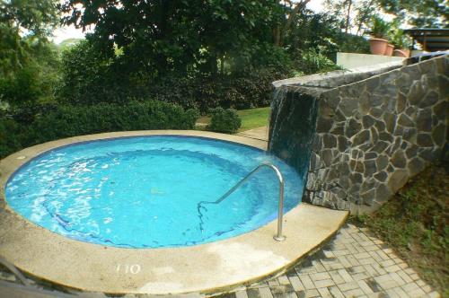 a small blue pool with a metal pole in it at Malaga Herradura #25 with Private Pool in Herradura