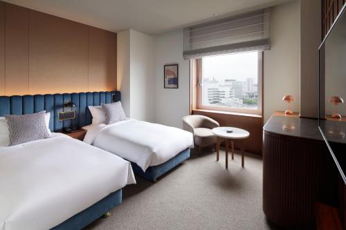 Katil atau katil-katil dalam bilik di The Mark Grand Hotel