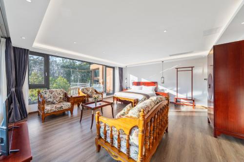 Kunming Boyue Hotelにあるベッド