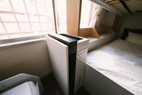 Postel nebo postele na pokoji v ubytování 50m 2DK Private Condo!Center of Tokyo!5min Akasaka sta!!
