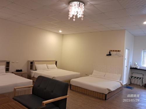 Postel nebo postele na pokoji v ubytování Tianyuan Nanwan Homestay